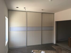 Melamine and acrylic sliding doors for closet