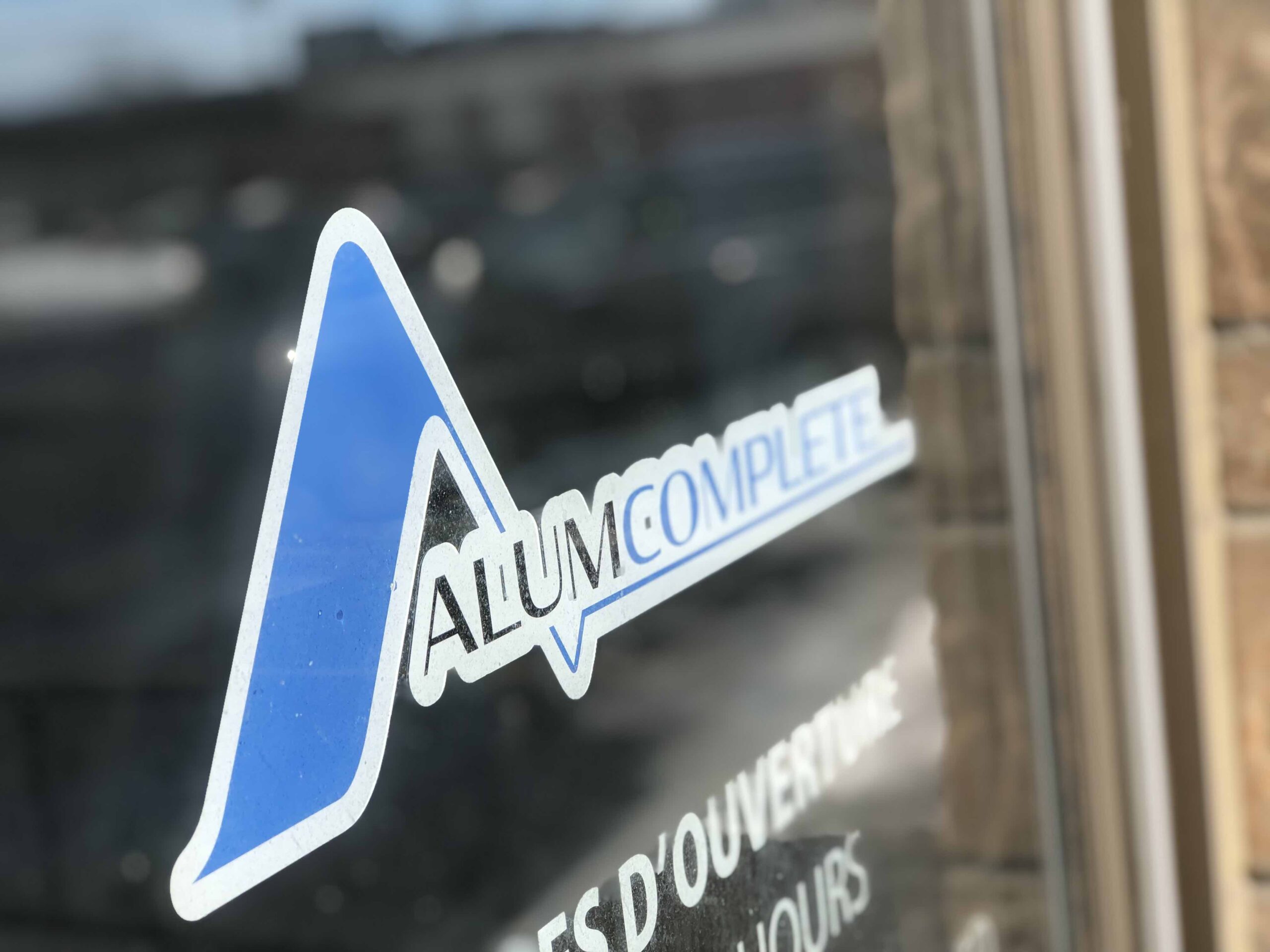 AlumComplete logo