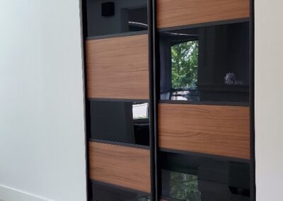 Modern MDF and acrylic pivot doors for pantry