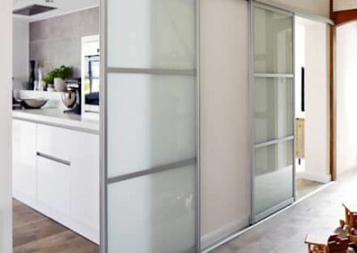 white glass room separating sliding doors